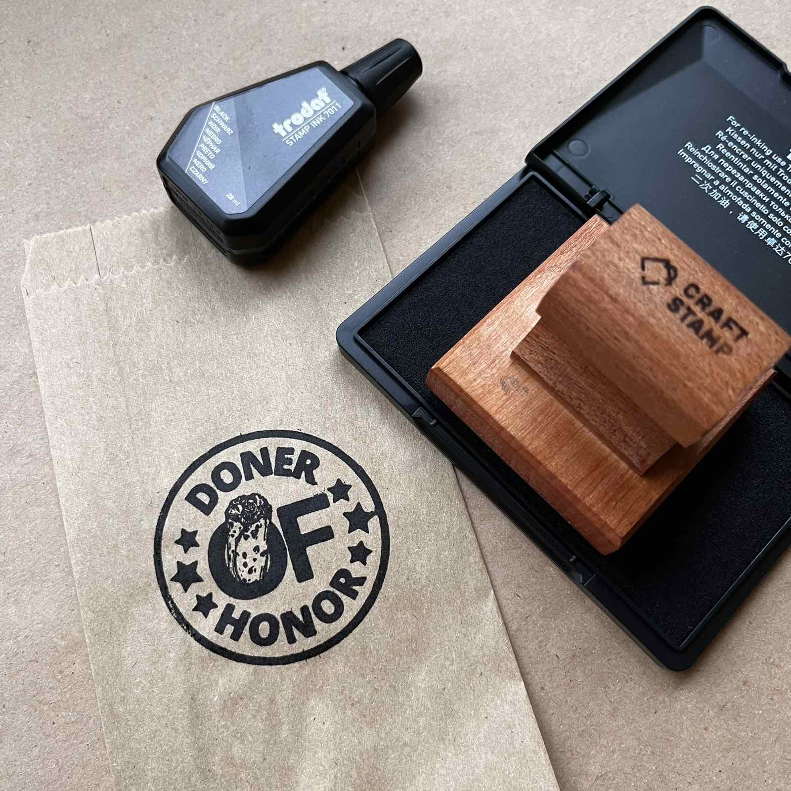 a stamp and a paper bag